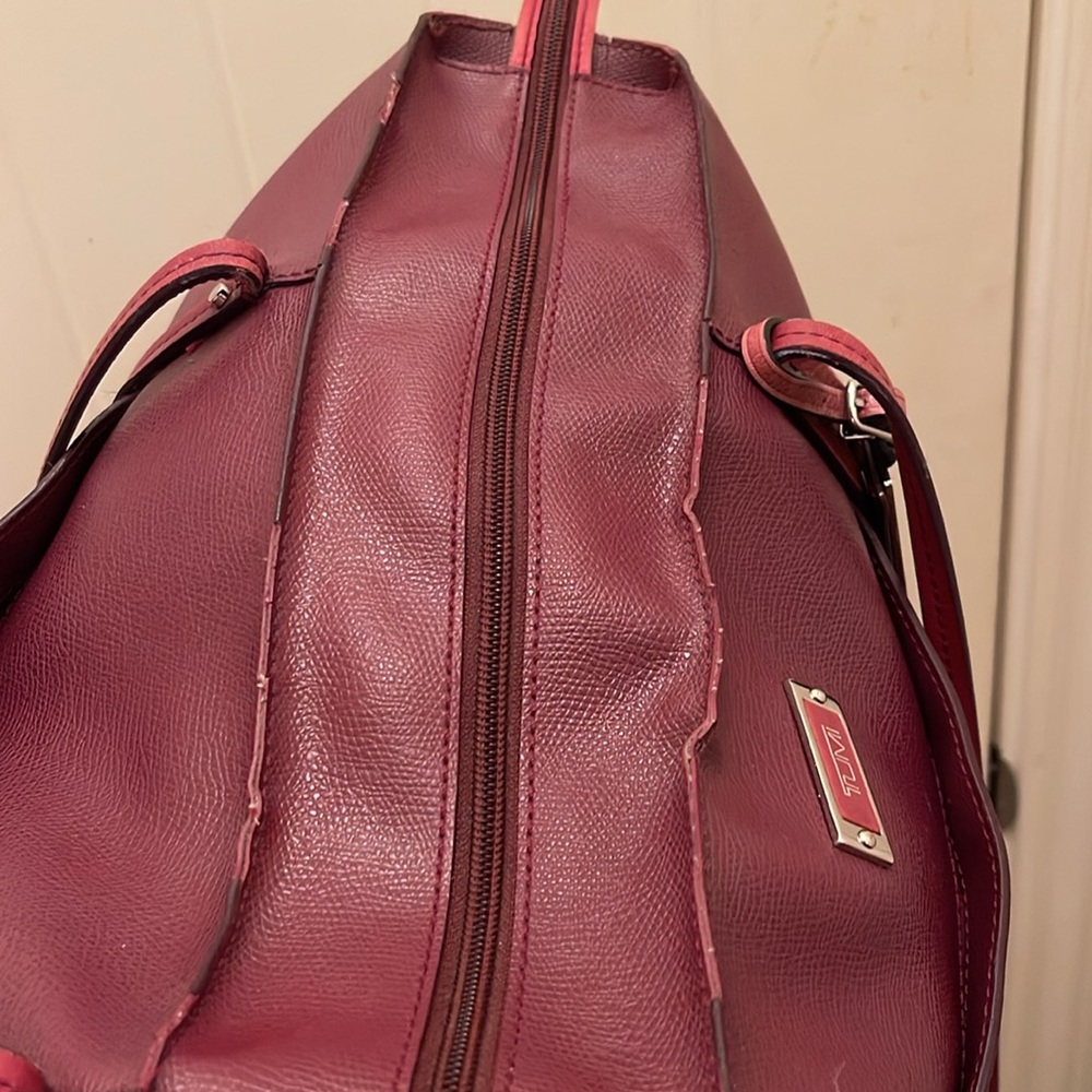 Tumi please check all picture of condition - Picture 9 of 17